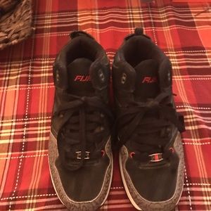 Black and gray fubu shoes